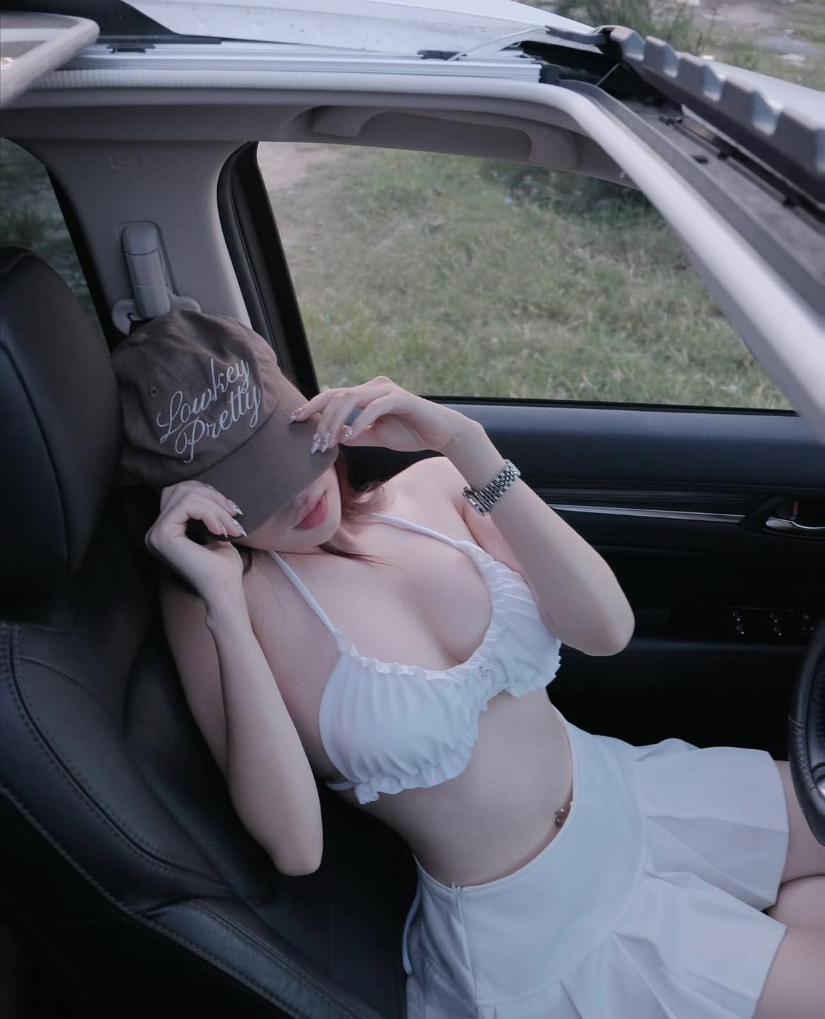 Demo photo of bikini taken in car.
